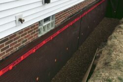 Exterior sealer and curtain drain